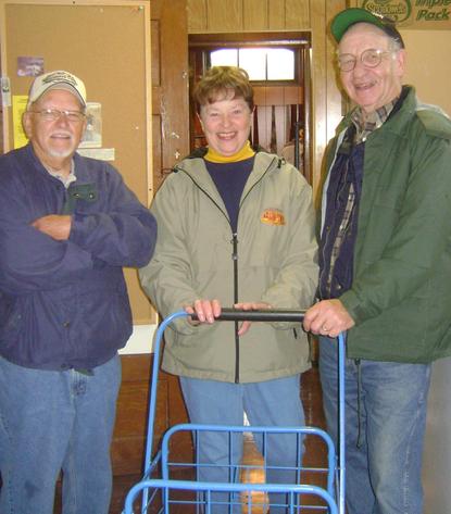 Carryout volunteers Glenn, Bonnie, and Ken